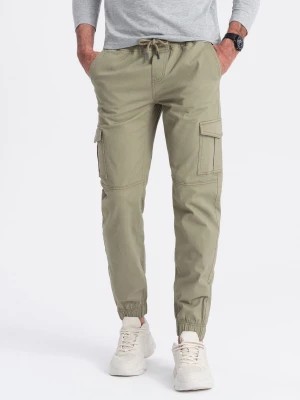 Zdjęcie produktu Spodnie męskie JOGGERY z zapinanymi kieszeniami cargo - khaki V1 OM-PAJO-0123
 -                                    L