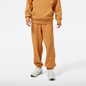 Zdjęcie produktu Spodnie męskie New Balance MP23551TOB - pomarańczowe