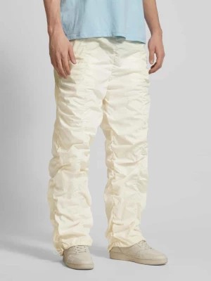 Zdjęcie produktu Spodnie o kroju baggy fit z marszczeniami REVIEW