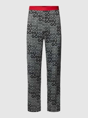 Zdjęcie produktu Spodnie od piżamy z detalami z logo model ‘Monogram’ HUGO