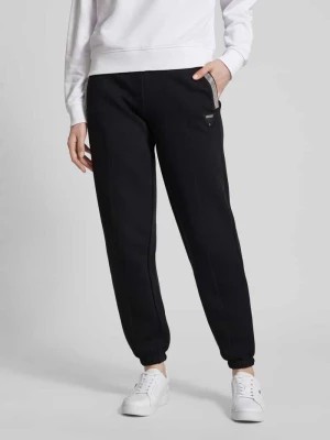 Zdjęcie produktu Spodnie sportowe z elastycznym pasem model ‘KIARA’ Guess Activewear