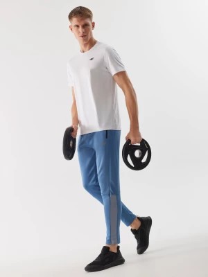 Zdjęcie produktu Spodnie treningowe szybkoschnące męskie - niebieskie 4F