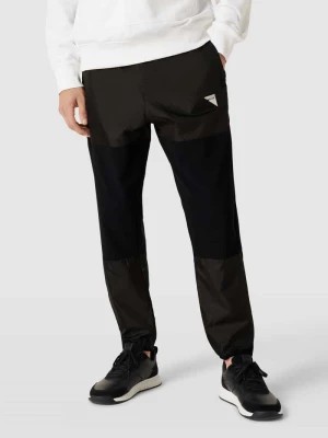 Zdjęcie produktu Spodnie typu track pants z naszywką z logo model ‘Diger’ HUGO