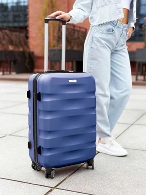 Zdjęcie produktu Średnich rozmiarów walizka niebieska z tworzywa ABS+ - Peterson