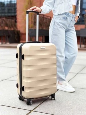 Zdjęcie produktu Średnich rozmiarów walizka złota z tworzywa ABS+ - Peterson