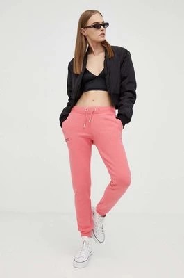 Zdjęcie produktu Superdry spodnie dresowe kolor różowy gładkie