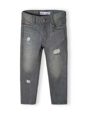 Zdjęcie produktu Szare spodnie jeansowe z przetarciami dla chłopca - Minoti