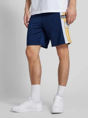 Zdjęcie produktu Szorty treningowe o kroju regular fit z kieszeniami zapinanymi na zamek błyskawiczny adidas Originals