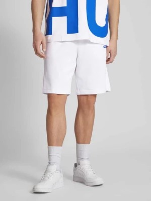 Zdjęcie produktu Szorty z dzianiny dresowej o kroju regular fit z naszywką z logo model ‘Nasensio’ Hugo Blue