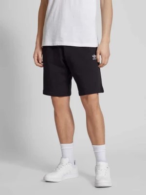 Zdjęcie produktu Szorty z dzianiny dresowej o kroju regular fit z wyhaftowanym logo model ‘ESSENTIAL’ adidas Originals