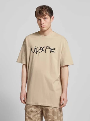 Zdjęcie produktu T-shirt z nadrukiem z napisem model ‘GIZA’ mister tee