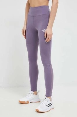 Zdjęcie produktu The North Face legginsy sportowe Movmynt damskie kolor fioletowy gładkie