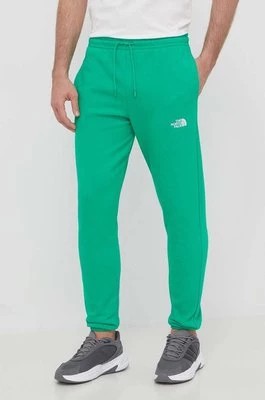 Zdjęcie produktu The North Face spodnie dresowe kolor zielony gładkie NF0A7ZJBPO81