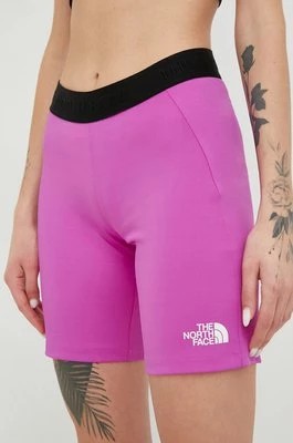 Zdjęcie produktu The North Face szorty sportowe Mountain Athletics damskie kolor fioletowy gładkie medium waist