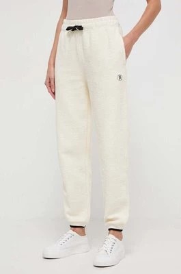 Zdjęcie produktu Tommy Hilfiger spodnie dresowe bawełniane kolor beżowy gładkie WW0WW40602