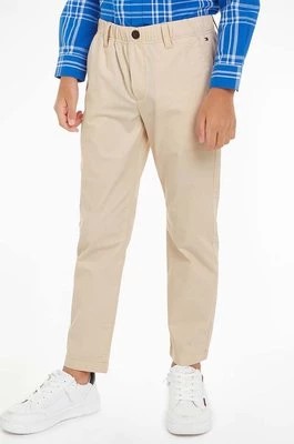 Zdjęcie produktu Tommy Hilfiger spodnie dziecięce kolor beżowy gładkie