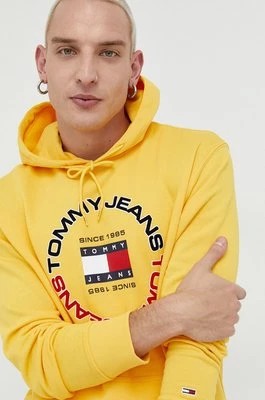 Zdjęcie produktu Tommy Jeans bluza bawełniana męska kolor żółty z kapturem z nadrukiem