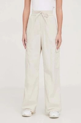 Zdjęcie produktu Tommy Jeans spodnie damskie kolor beżowy szerokie high waist DW0DW17317