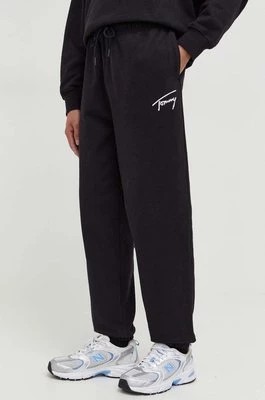 Zdjęcie produktu Tommy Jeans spodnie dresowe bawełniane kolor czarny gładkie DM0DM18356