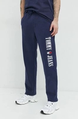 Zdjęcie produktu Tommy Jeans spodnie dresowe bawełniane męskie kolor granatowy z aplikacją