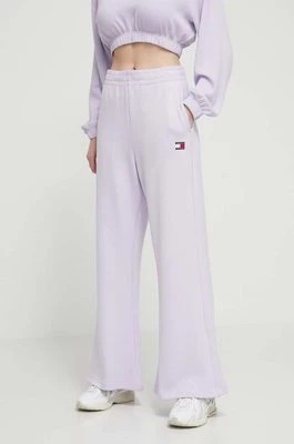 Zdjęcie produktu Tommy Jeans spodnie dresowe kolor fioletowy gładkie DW0DW17312