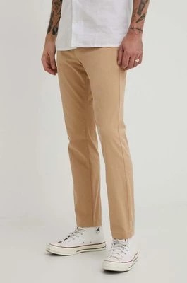 Zdjęcie produktu Tommy Jeans spodnie męskie kolor beżowy dopasowane DM0DM19166