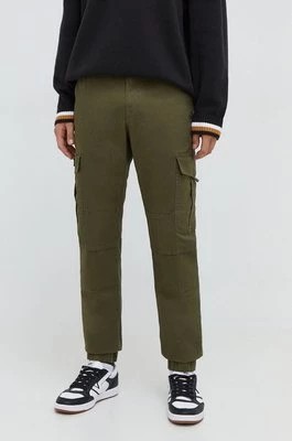 Zdjęcie produktu Tommy Jeans spodnie męskie kolor zielony DM0DM18342