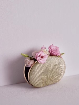 Zdjęcie produktu Torebka w kształcie muszli z połyskującego materiału TARANKO