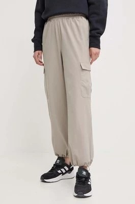 Zdjęcie produktu Under Armour spodnie damskie kolor beżowy fason cargo high waist