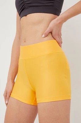 Zdjęcie produktu Under Armour szorty damskie kolor pomarańczowy gładkie high waist
