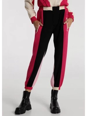 Zdjęcie produktu Victorio & Lucchino Spodnie dresowe w kolorze czarno-różowym rozmiar: M