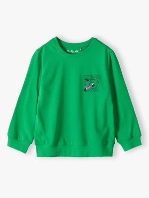 Zdjęcie produktu Zielona dzianinowa bluzka z kolorowymi nadrukami - 5.10.15.