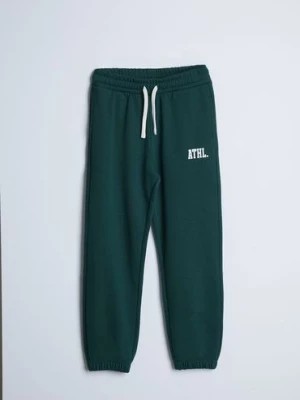 Zdjęcie produktu Zielone spodnie dresowe ATHL.- Limited Edition