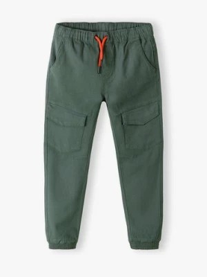 Zdjęcie produktu Zielone spodnie joggery dla chłopca Lincoln & Sharks by 5.10.15.