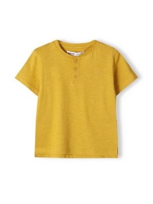 Zdjęcie produktu Zółty t-shirt bawełniany basic dla niemowlaka z guzikami Minoti