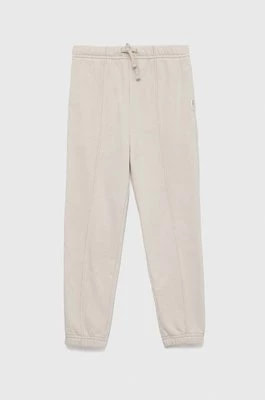Zdjęcie produktu Abercrombie & Fitch spodnie dresowe dziecięce kolor beżowy gładkie