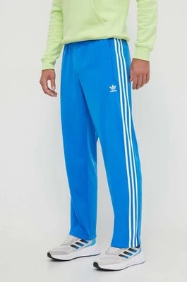 Zdjęcie produktu adidas Originals spodnie dresowe kolor niebieski z aplikacją IJ7056