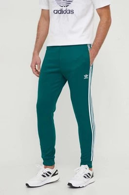 Zdjęcie produktu adidas Originals spodnie dresowe kolor zielony z aplikacją IR9886