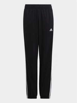 Zdjęcie produktu adidas Spodnie dresowe Essentials 3-Stripes Woven Tracksuit Bottoms HR6334 Czarny Slim Fit