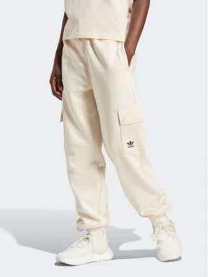 Zdjęcie produktu adidas Spodnie dresowe Essentials IR5906 Beżowy Loose Fit