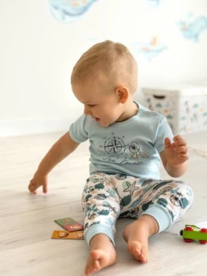 Zdjęcie produktu Bawełniane body niemowlęce z nadrukiem - bękitne NINI