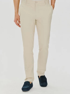 Zdjęcie produktu Beżowe gładkie spodnie męskie Pako Lorente