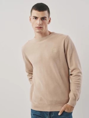 Zdjęcie produktu Beżowy bawełniany sweter męski z logo OCHNIK