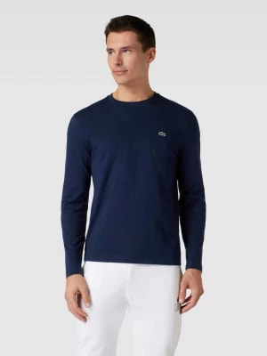 Zdjęcie produktu Bluzka o kroju regular fit w jednolitym kolorze z długim rękawem i wyhaftowanym logo Lacoste