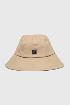 Zdjęcie produktu Calvin Klein Jeans kapelusz dziecięcy kolor beżowy
