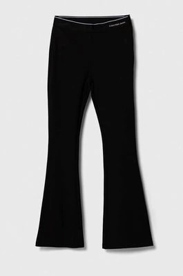 Zdjęcie produktu Calvin Klein Jeans legginsy dziecięce kolor czarny gładkie
