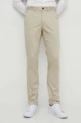 Zdjęcie produktu Calvin Klein spodnie męskie kolor beżowy w fasonie chinos