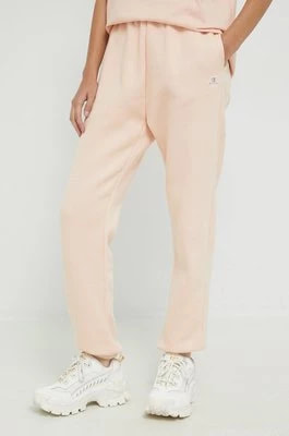 Zdjęcie produktu Champion spodnie dresowe damskie kolor pomarańczowy gładkie 115487-ASB