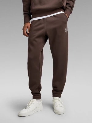 Zdjęcie produktu G-Star Spodnie dresowe w kolorze jasnobrązowym rozmiar: M