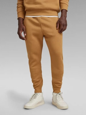 Zdjęcie produktu G-Star Spodnie dresowe w kolorze jasnobrązowym rozmiar: L